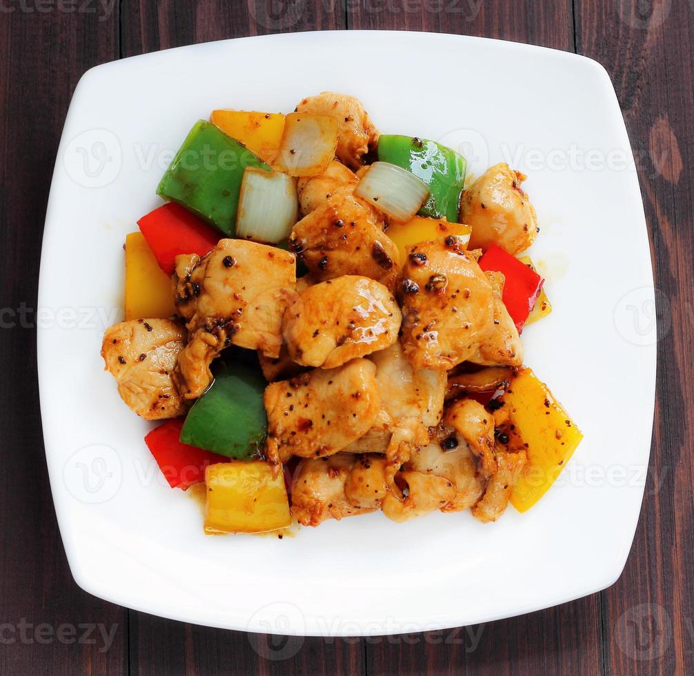 Chicken fried with black pepper. photo