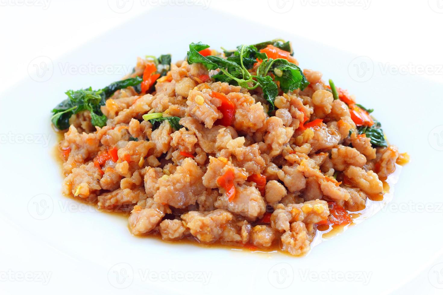 Basil leaves fried with pork and chili. photo