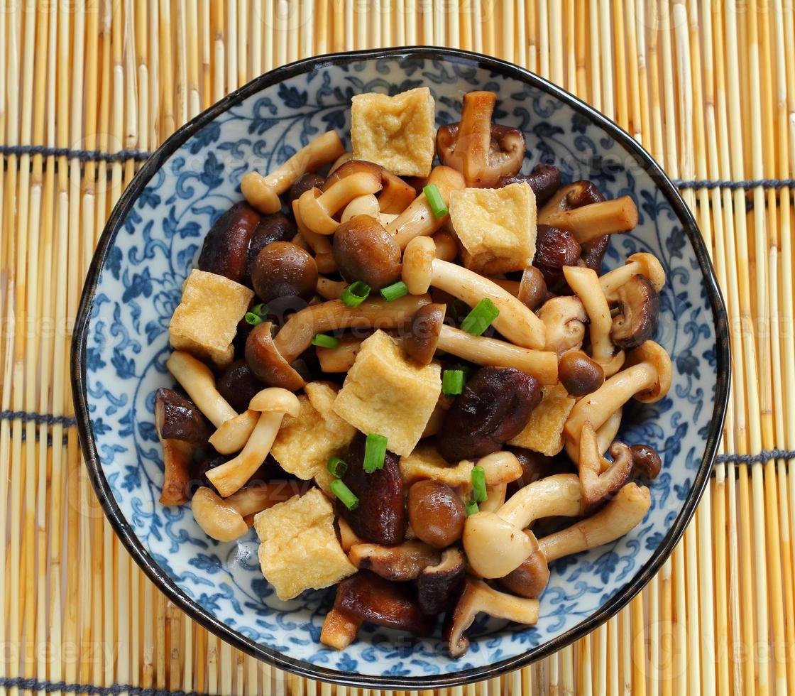 Tofu and mixed mushroom stir fried. photo