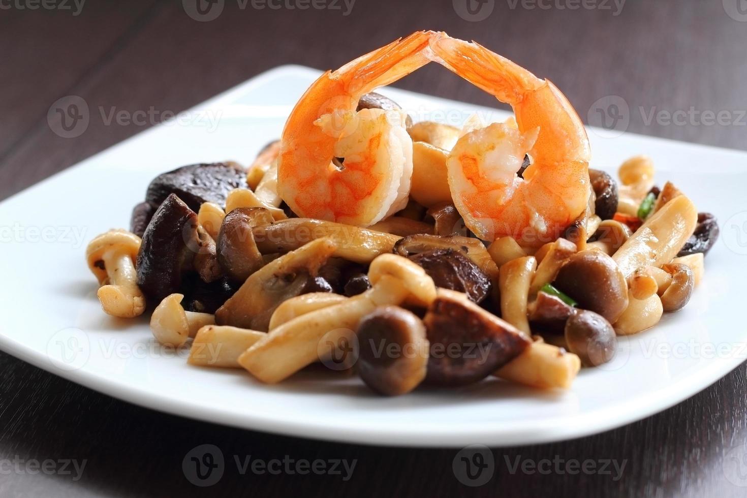 Shrimp and mixed mushroom stire fried. photo