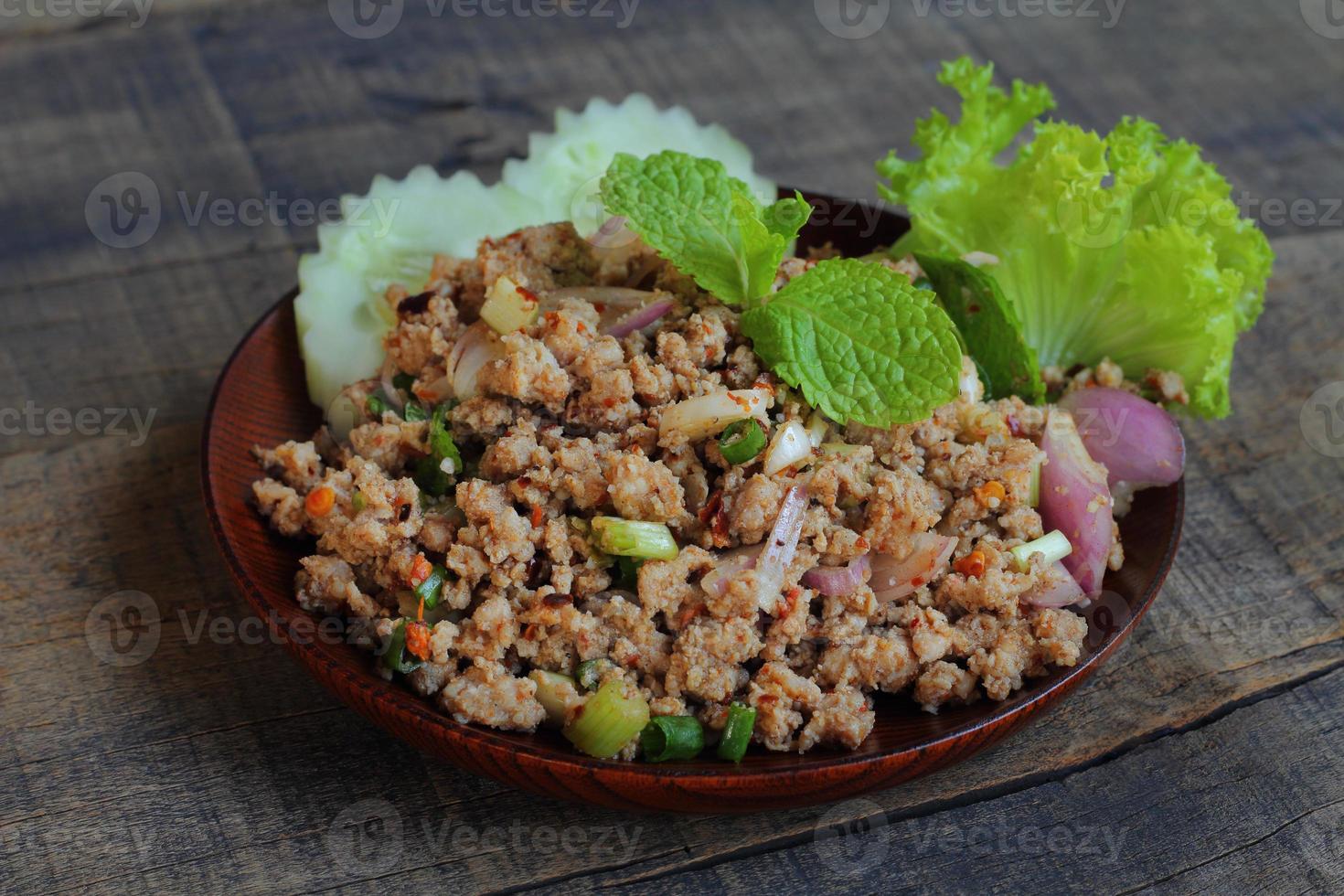 Spicy minced pork salad. photo