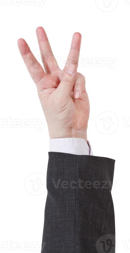 three fingers counting - hand gesture photo
