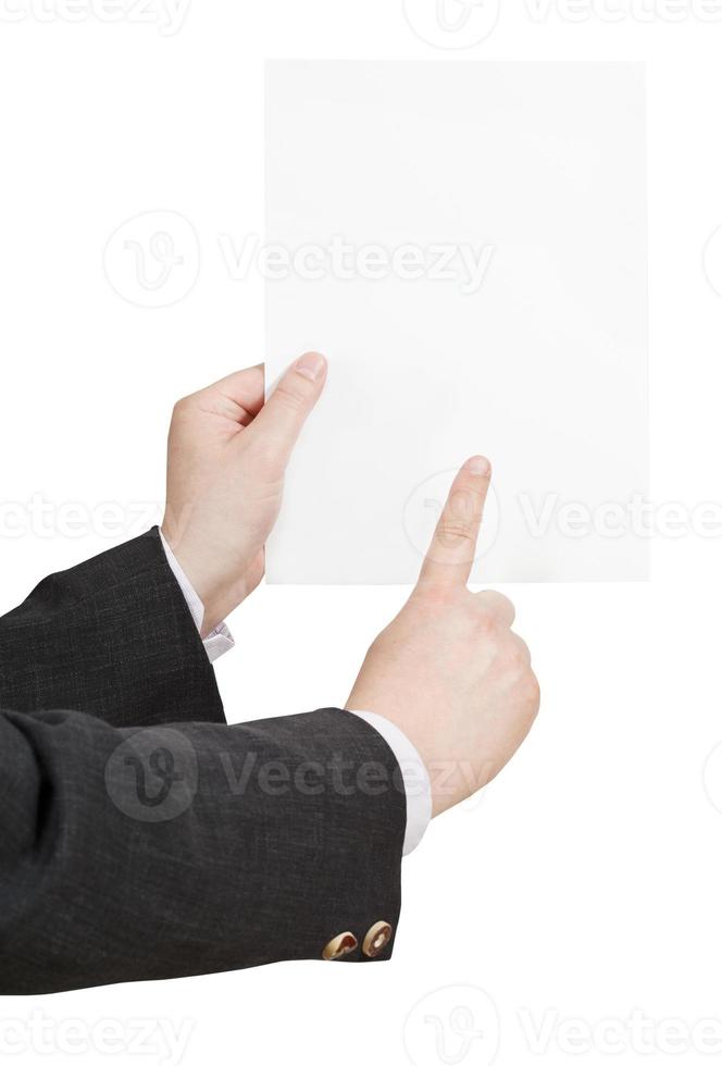 blank sheet of paper in businessman hand photo