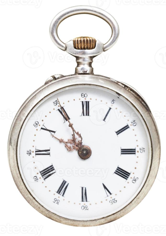 five minutes to ten o'clock on dial of retro watch photo