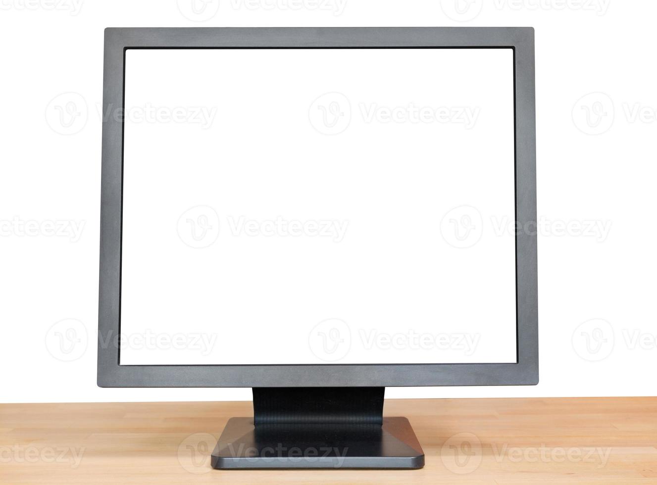 black display with cutout screen on wood table photo