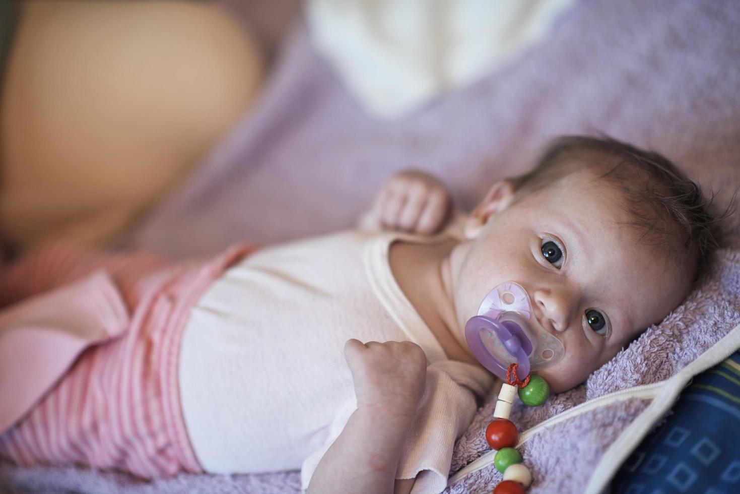 happy newborn little baby smilling photo