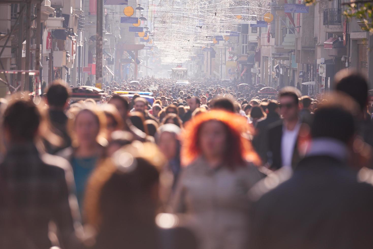 people crowd walking on street photo