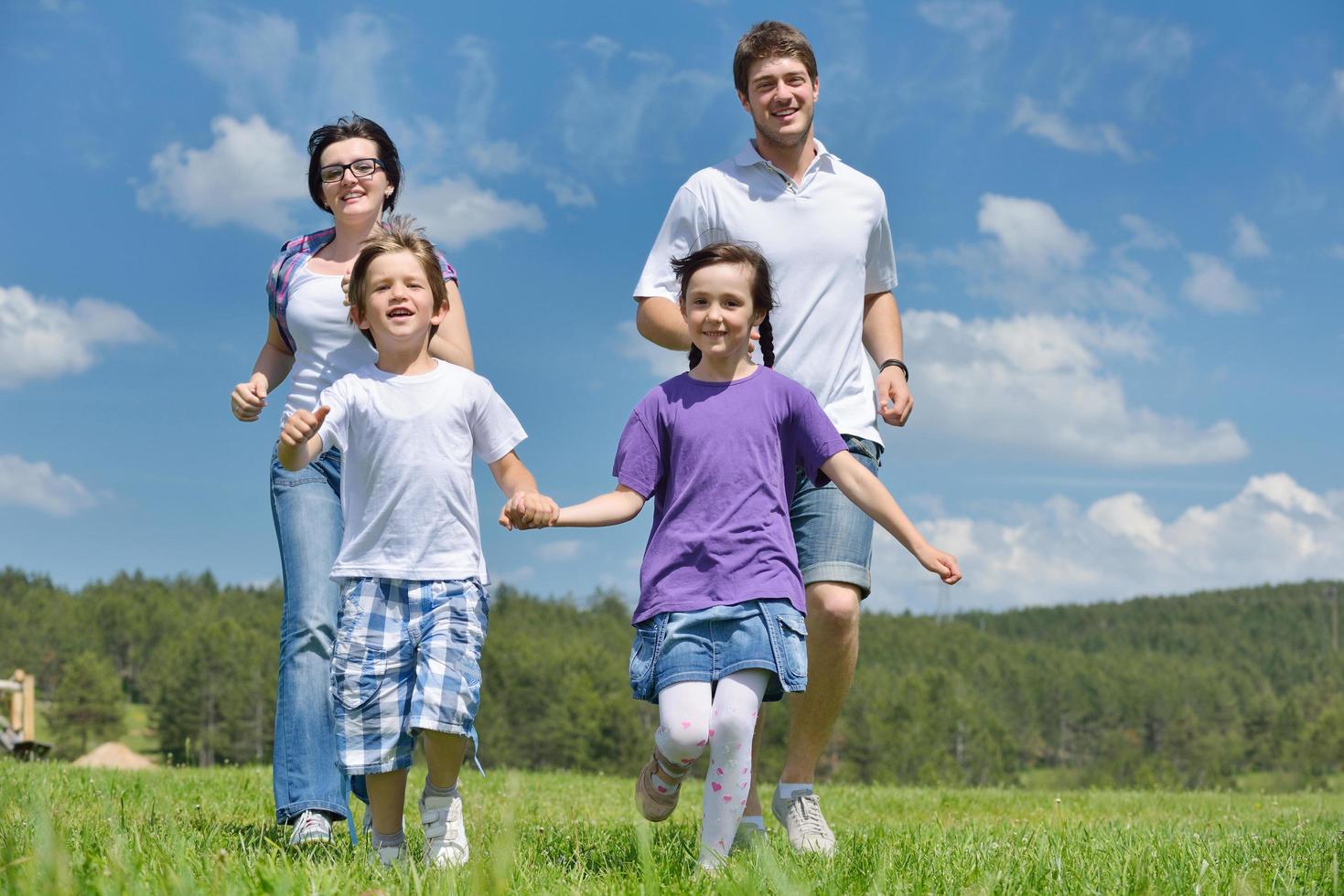 happy young family have fun outdoors photo