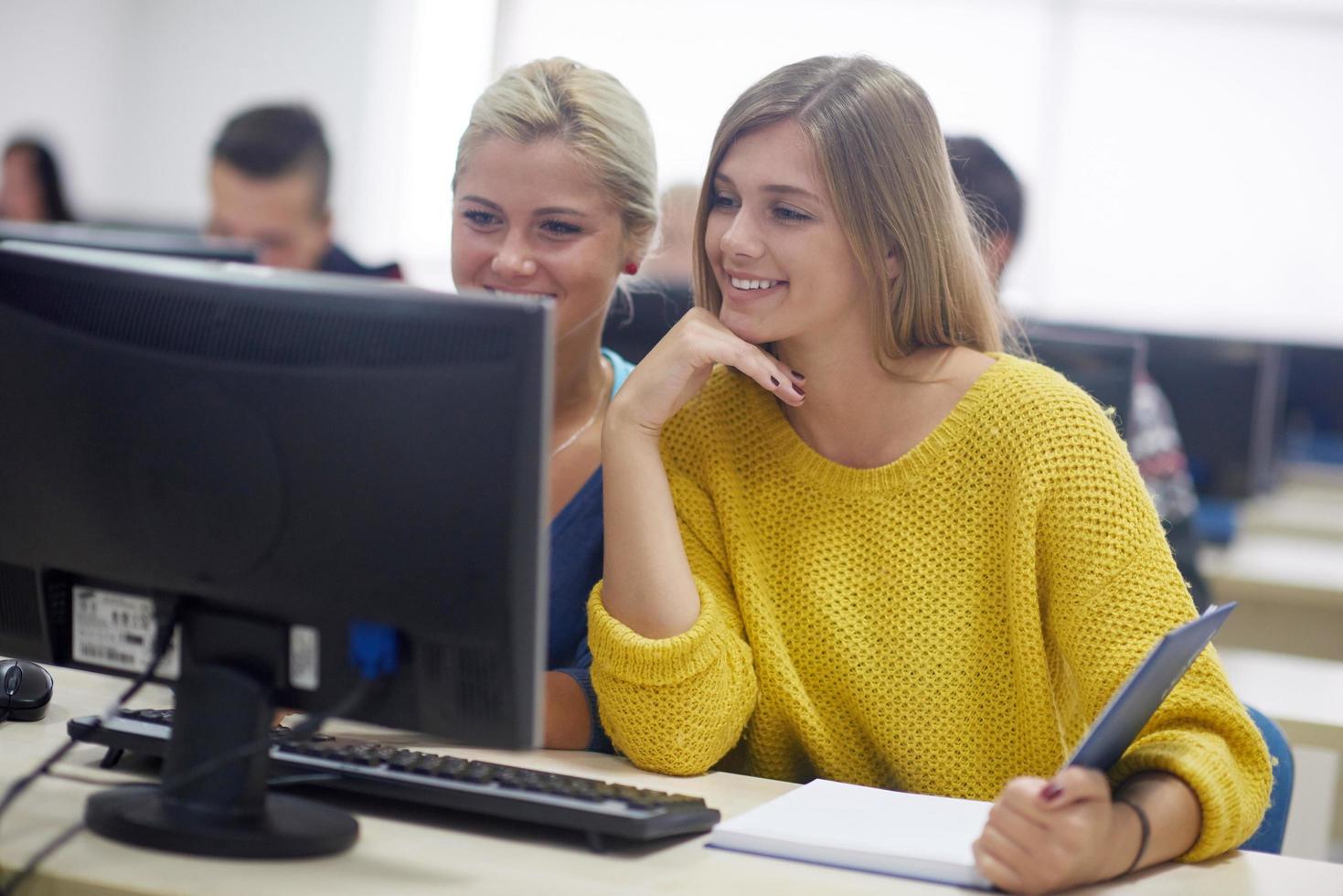 students group in computer lab classroom photo