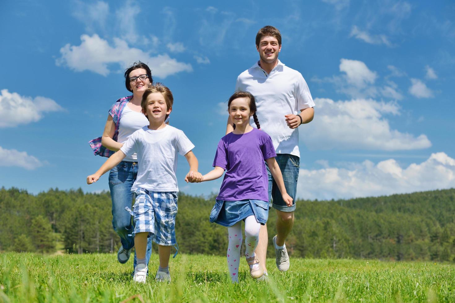 happy young family have fun outdoors photo