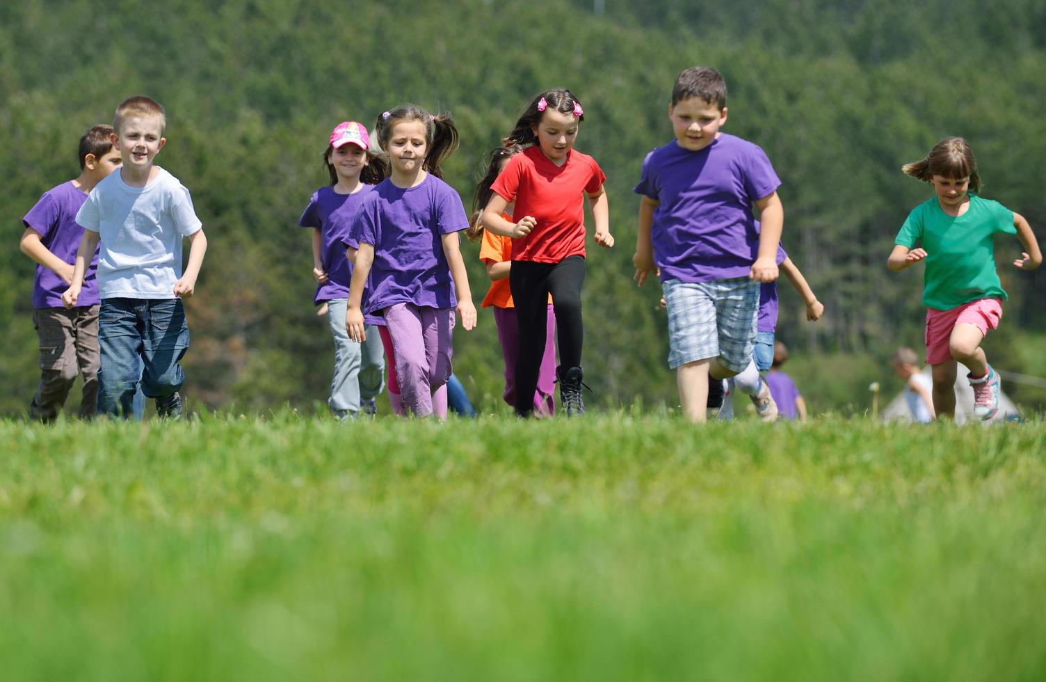 happy kids group  have fun in nature photo