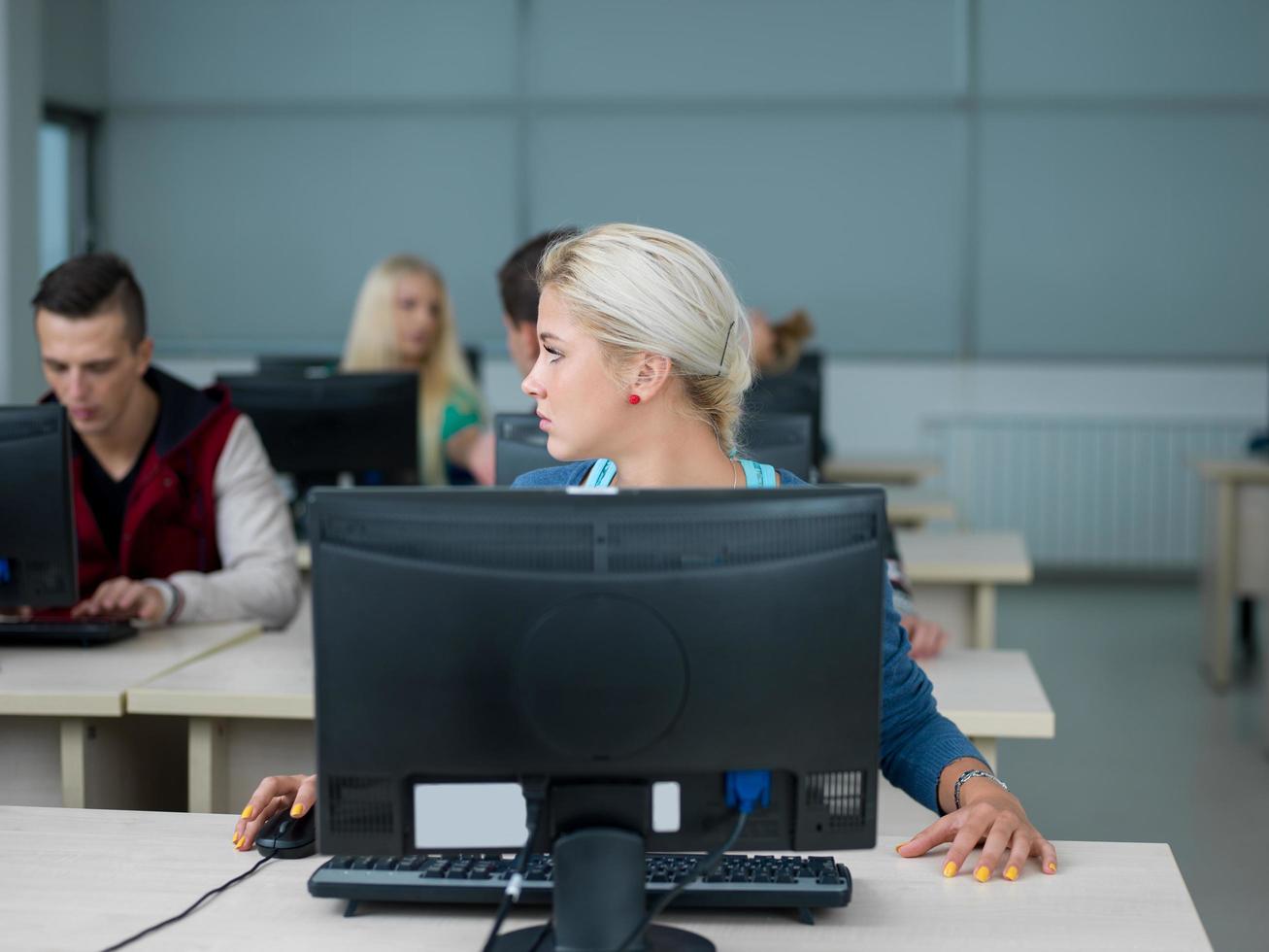 students group in computer lab classroom photo