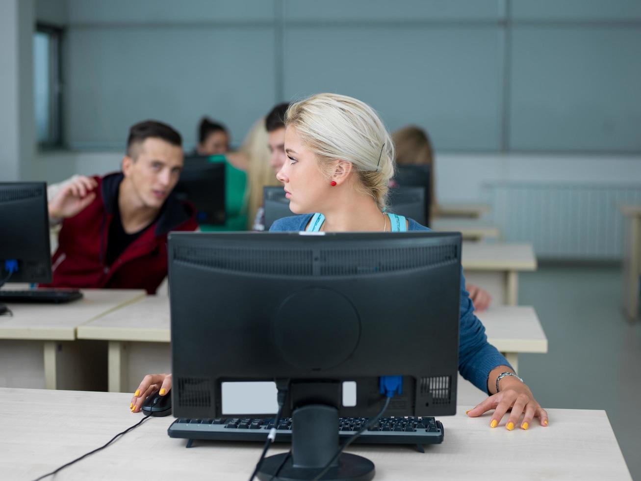 students group in computer lab classroom photo