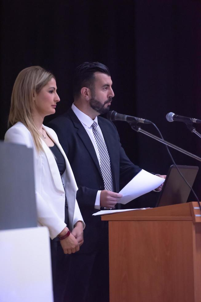 businesspeople giving a presentation photo