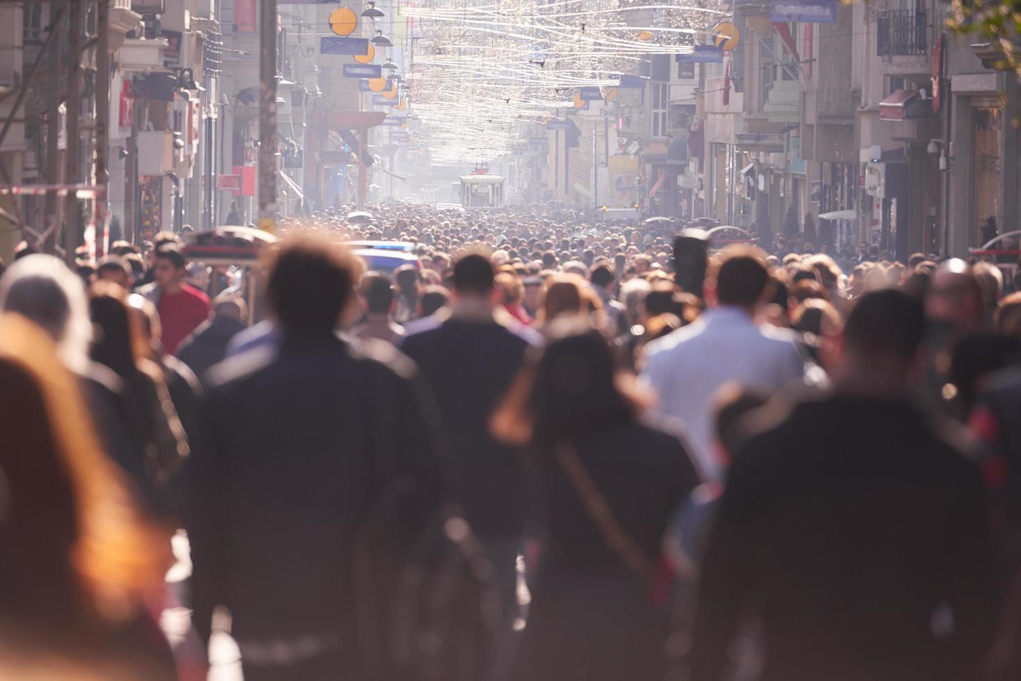 people crowd walking on street photo