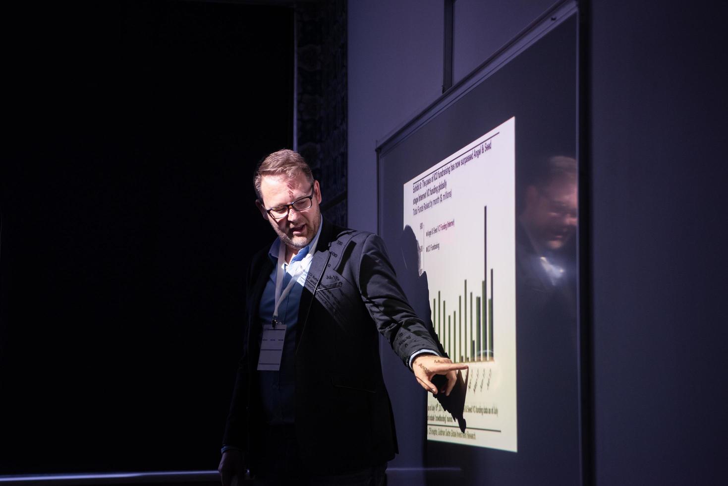 businessman giving presentations at conference room photo