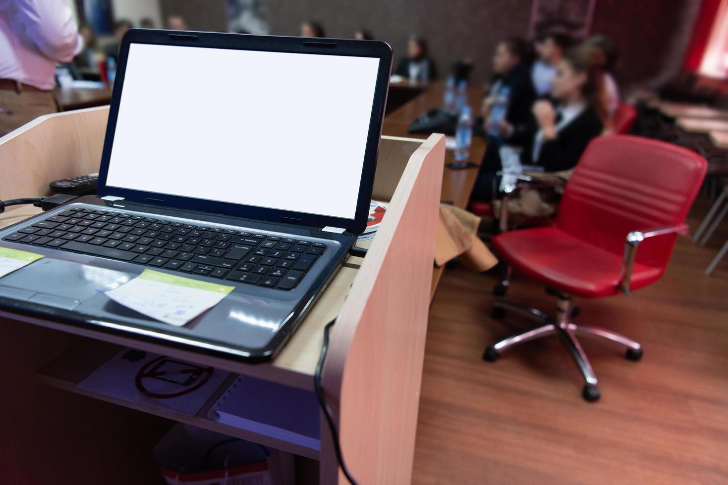 laptop computer at podium photo