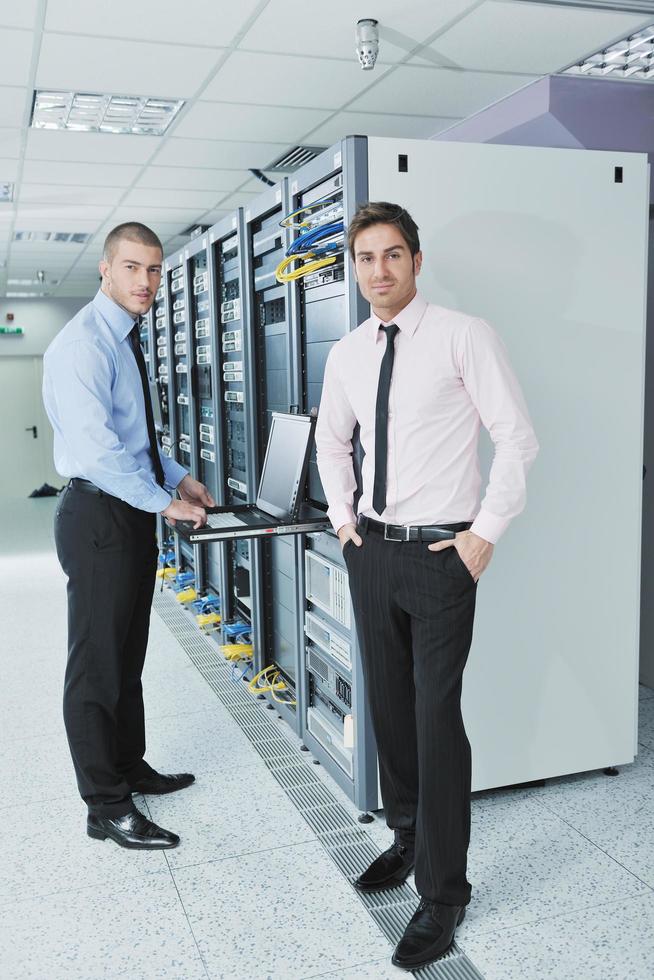 it engineers in network server room photo