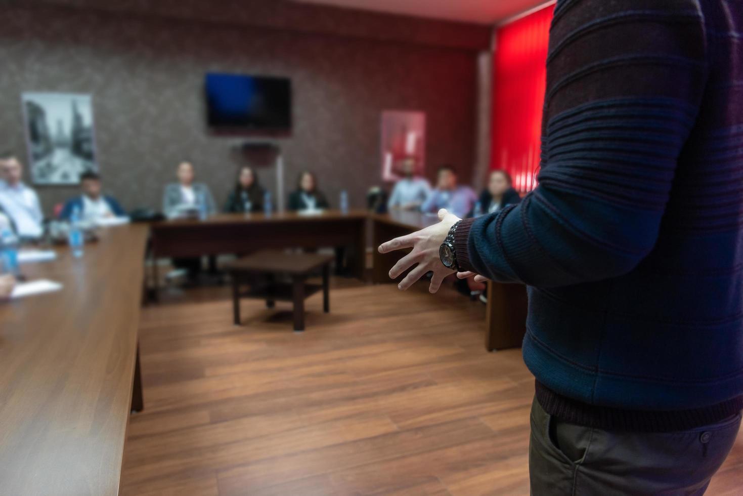 businessman giving presentations at conference room photo