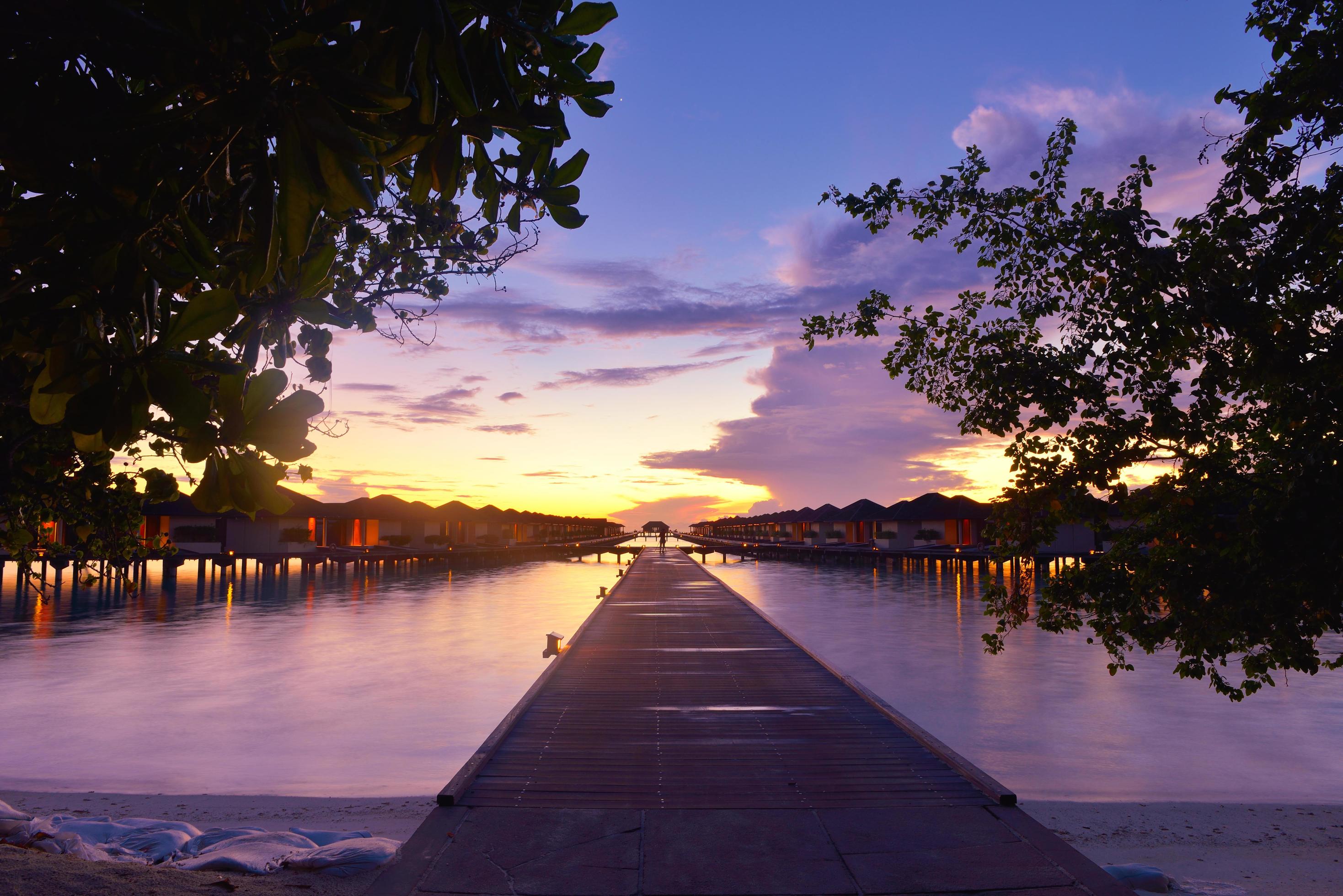 Tropical beach sunset 11927607 Stock Photo at Vecteezy