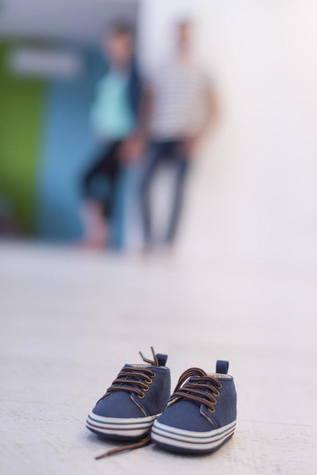 pair of blue baby shoes photo