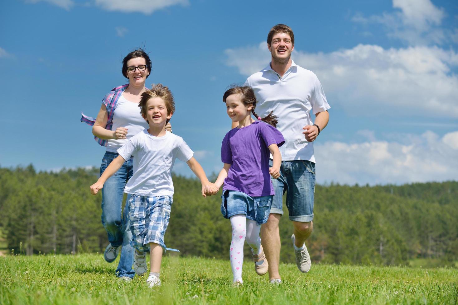 happy young family have fun outdoors photo