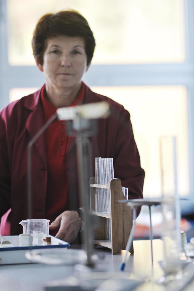 science and chemistry teacher portrait in classroom photo