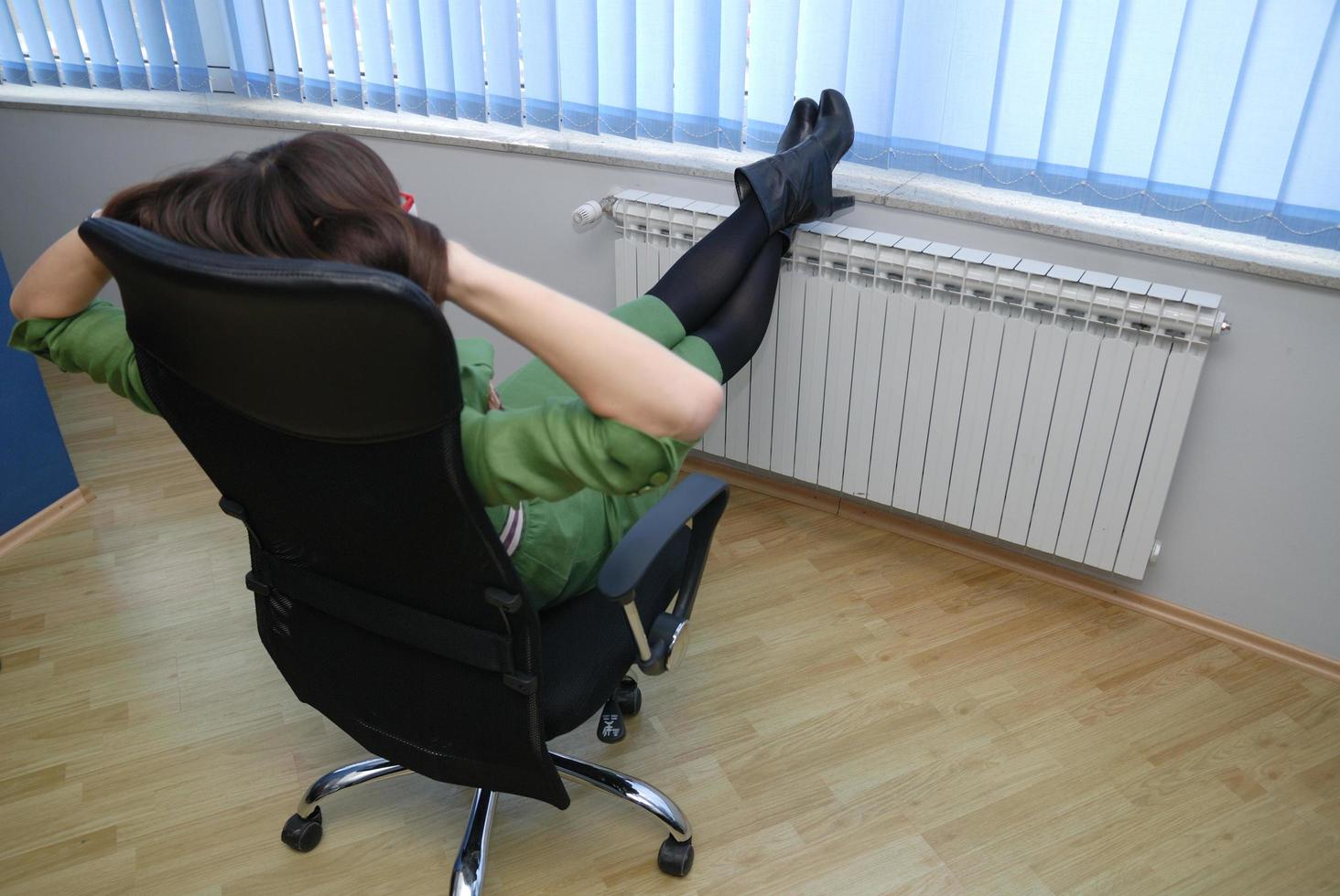 .businesswoman relaxing at the office photo