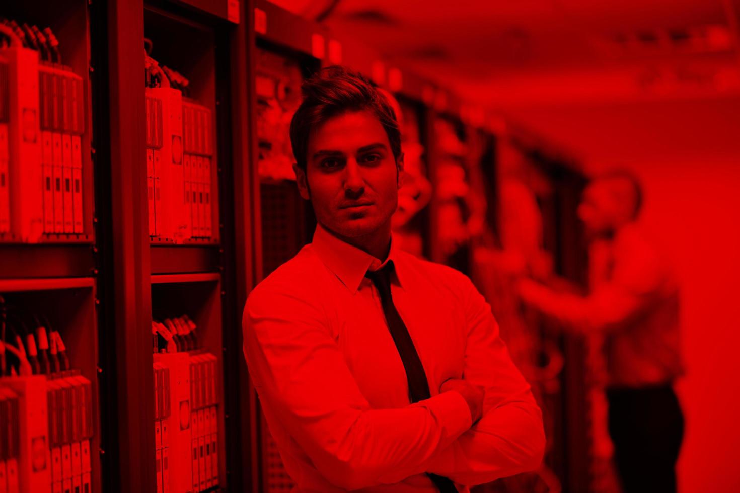 it engineers in network server room photo