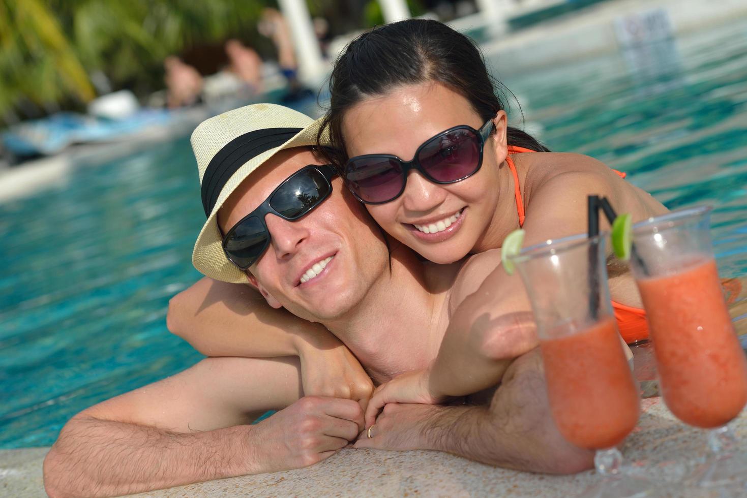 happy young couple relax and take fresh drink photo