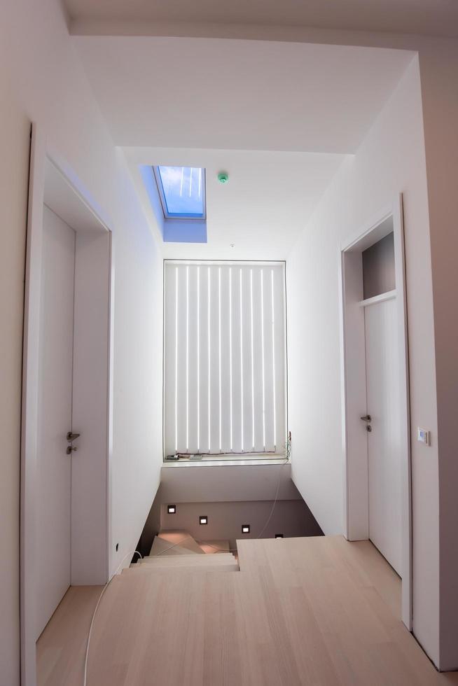 Sweden, 2022 - stylish interior with wooden stairway photo