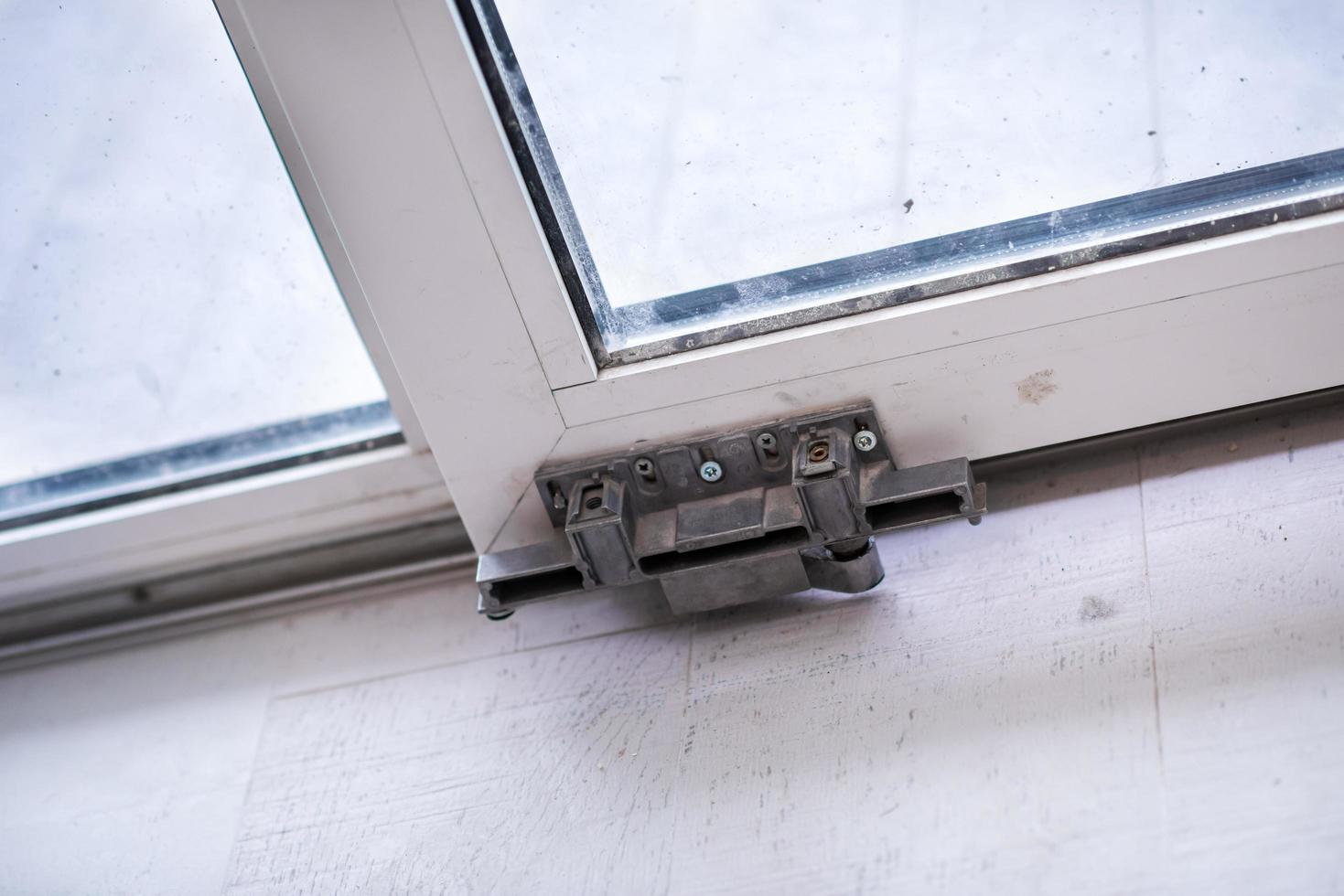 carpenters installing a balcony door photo