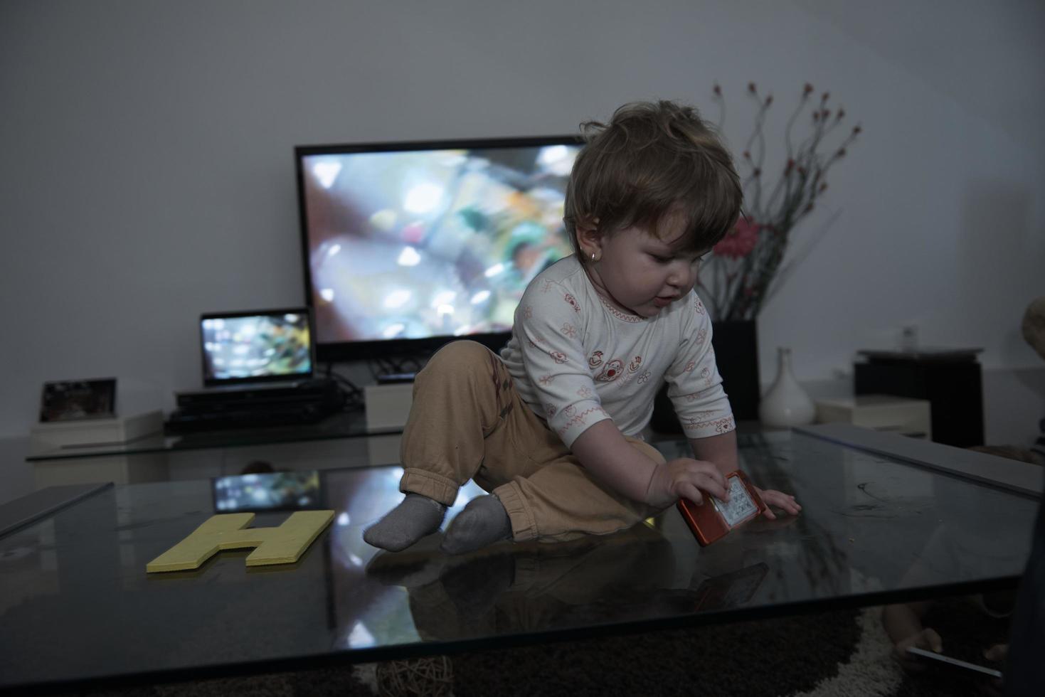 cute  little one year old baby and making first steps photo