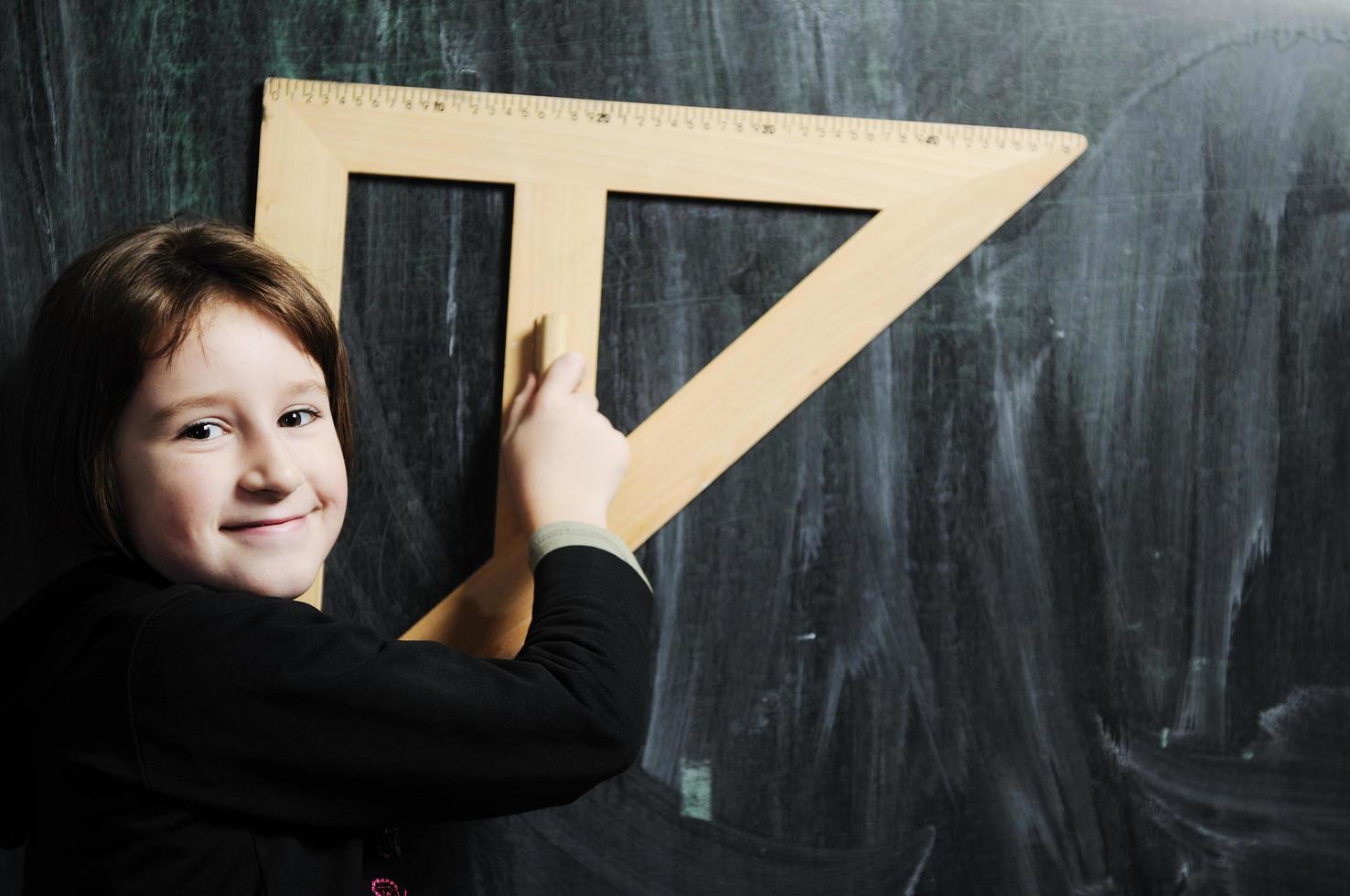 happy school girl on math classeshappy school girl on math class photo