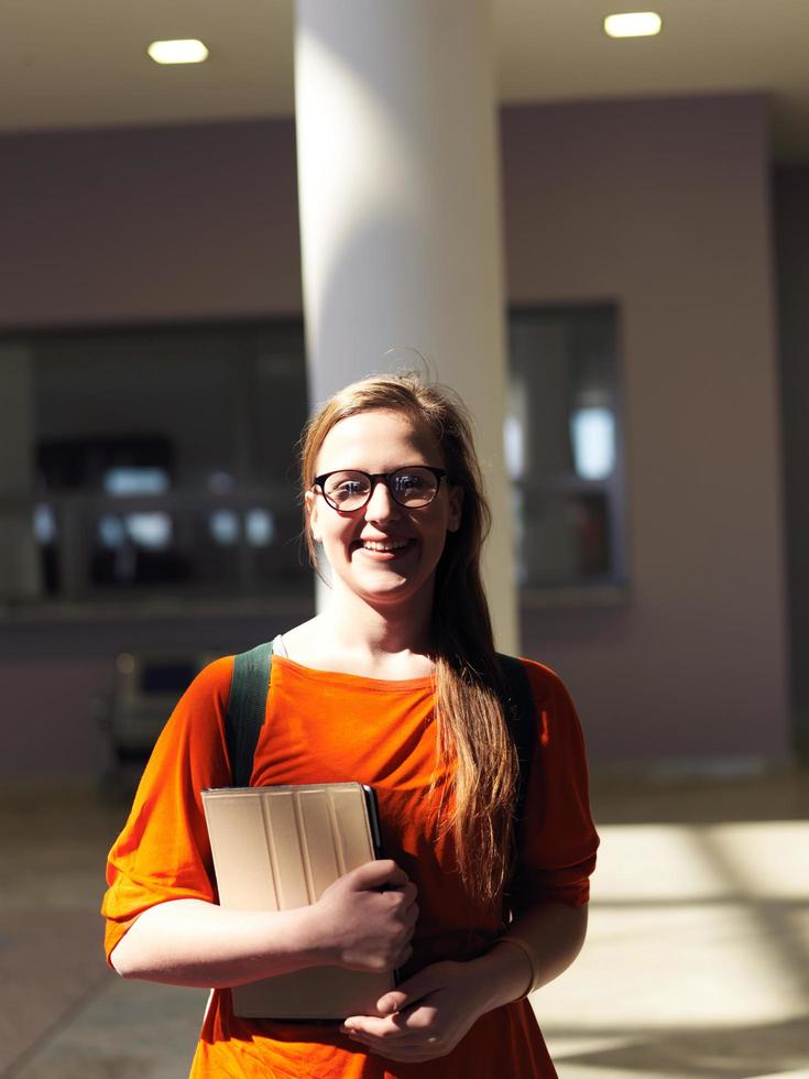 student girl with tablet computer photo