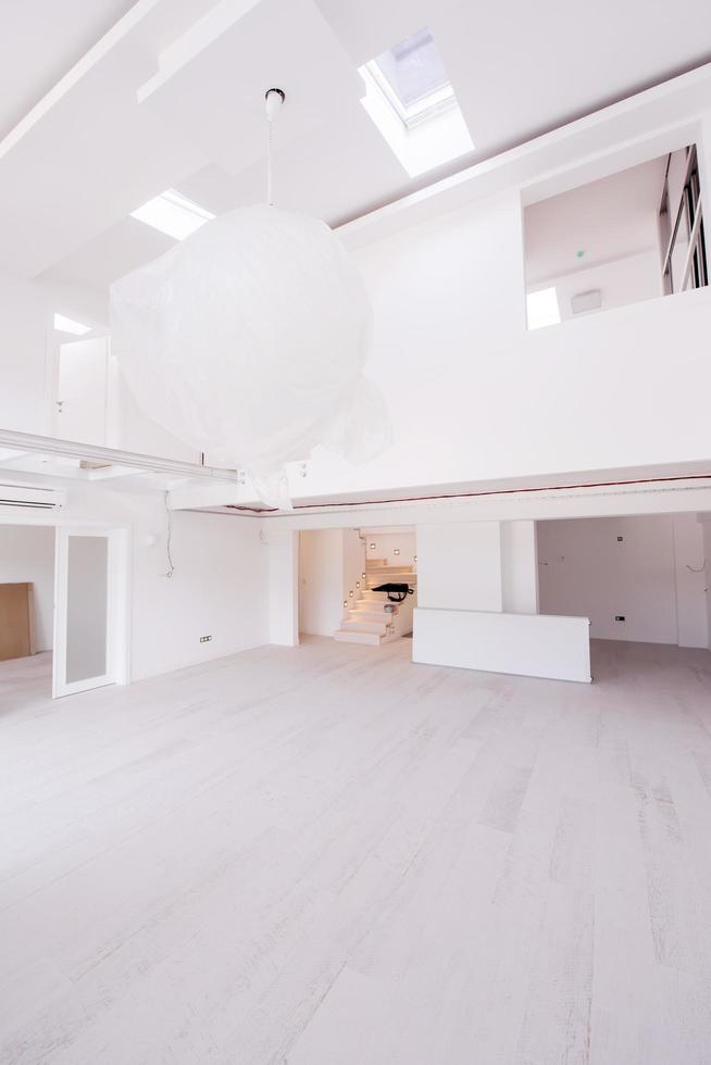 Sweden, 2022 - Interior of empty stylish modern open space two level apartment photo