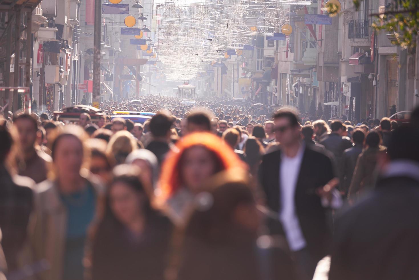 people crowd walking on street photo