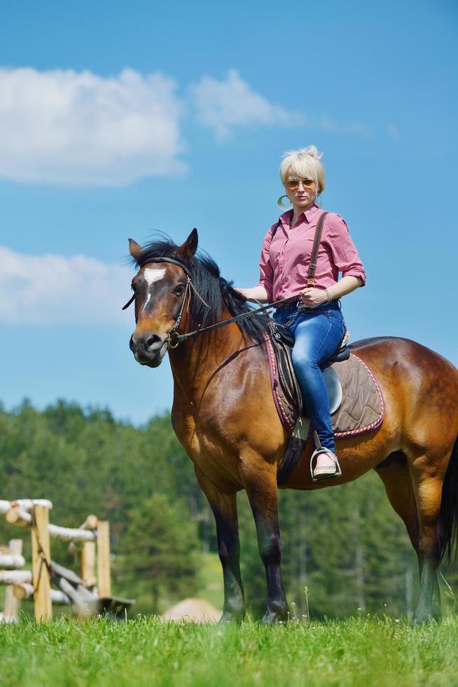 happy woman  ride  horse photo