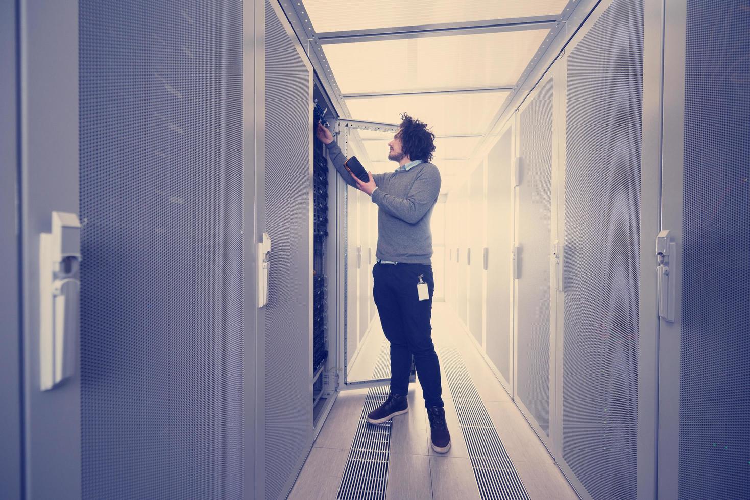 technician using digital cable analyzer photo
