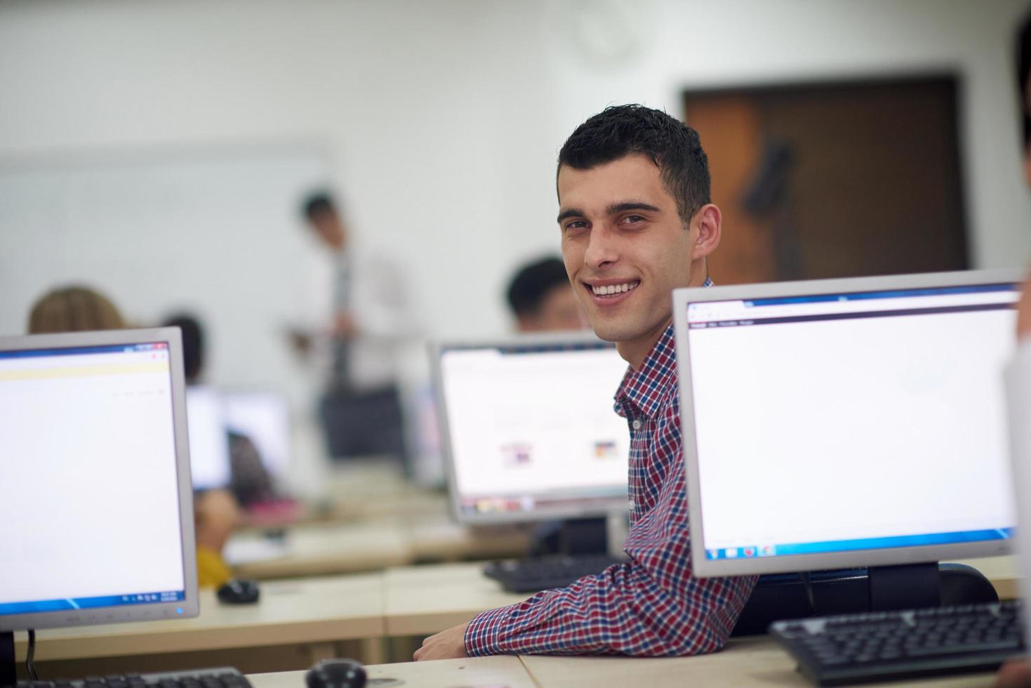 students group in computer lab classroom photo