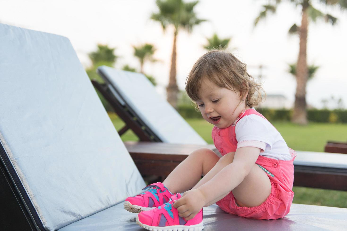 little cute girl enjoying summer vacations photo
