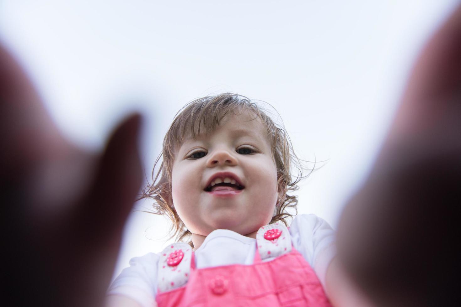 little girl spending time at backyard photo