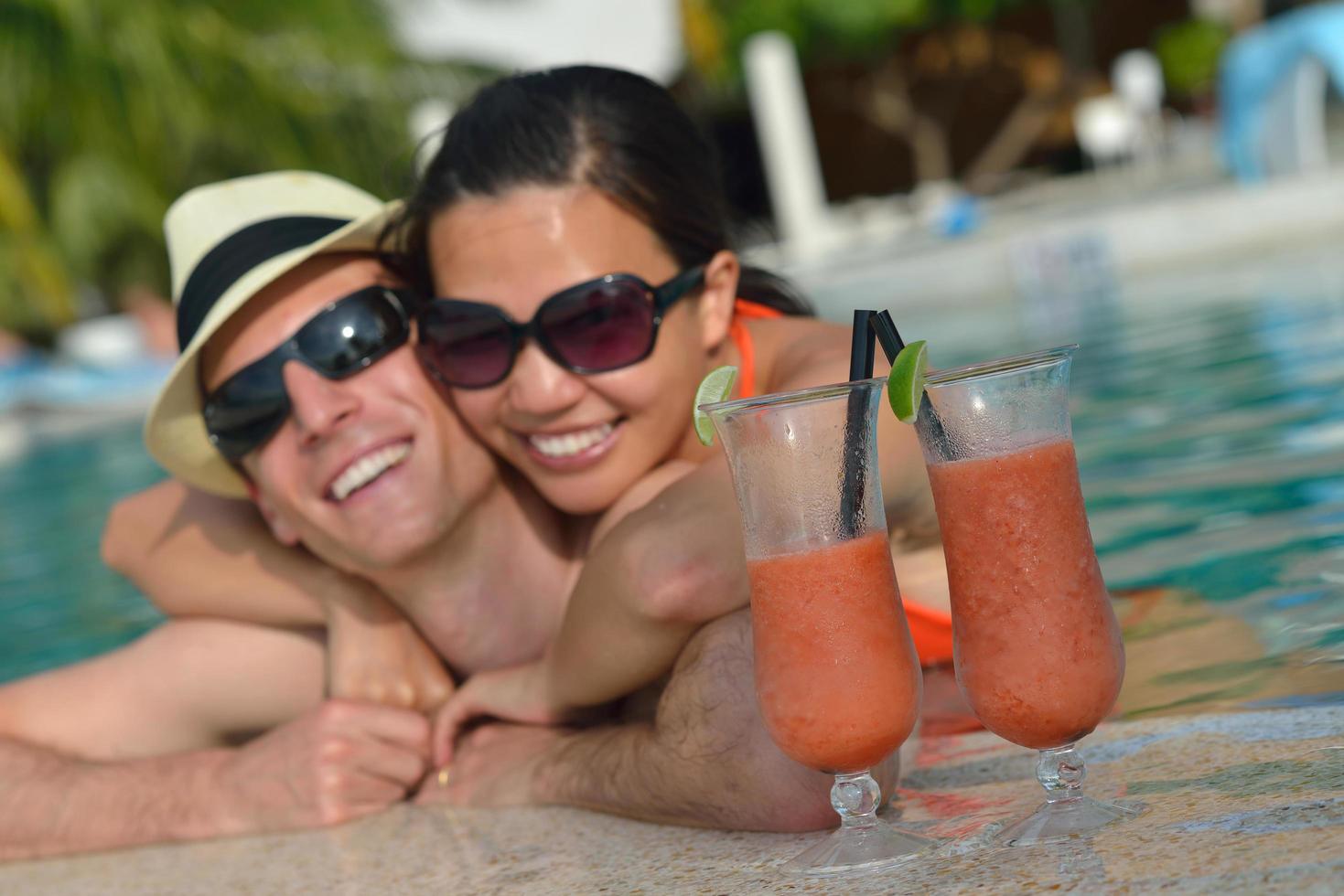 happy young couple relax and take fresh drink photo