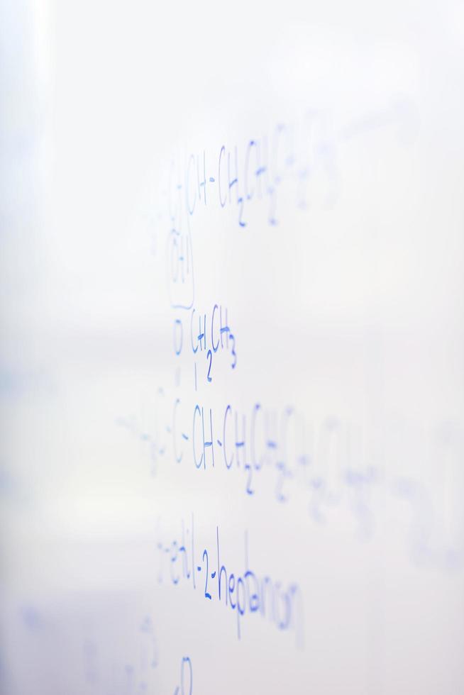 chemical molecule structure on white boar photo