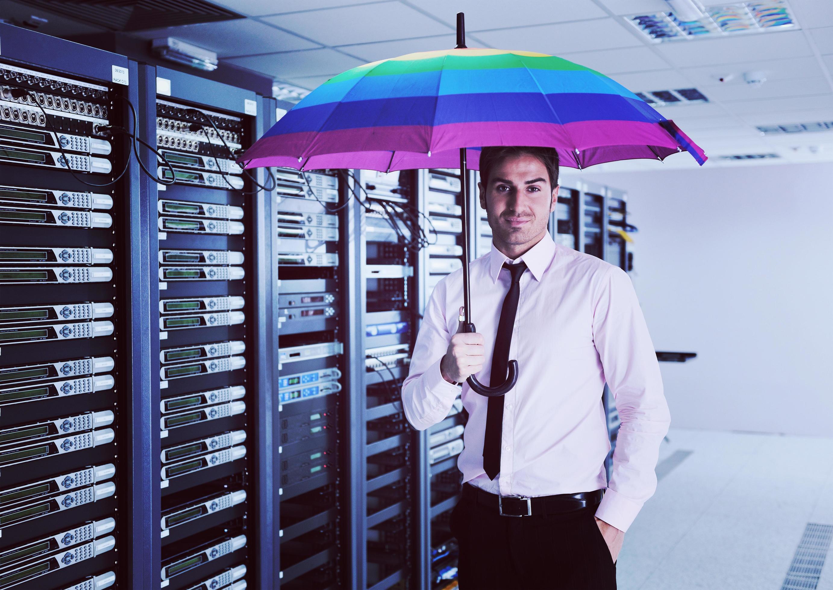 businessman hold umbrella in server room 11930320 Stock Photo at Vecteezy