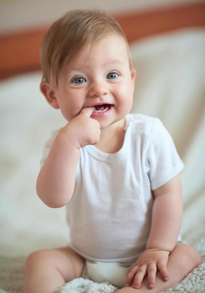 cute  little  newborn baby smilling photo