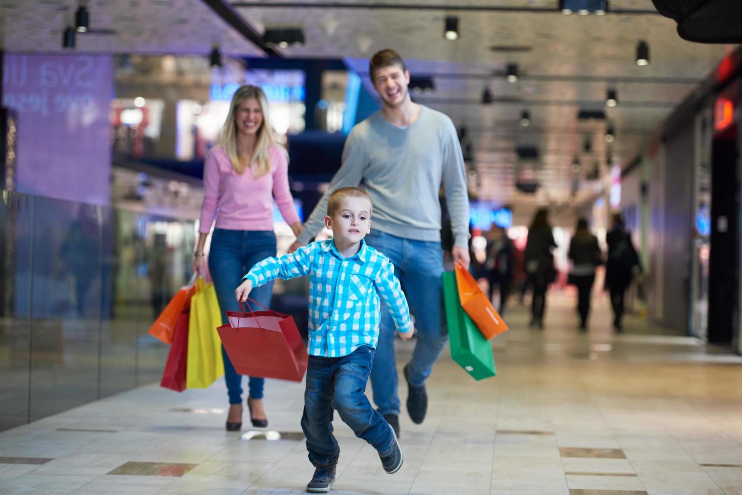 Sweden, 2022 - Family in shopping mall photo