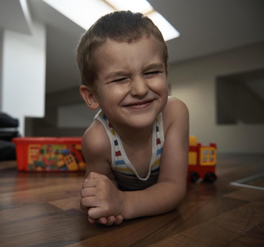 Little boy child playing with creative toys photo