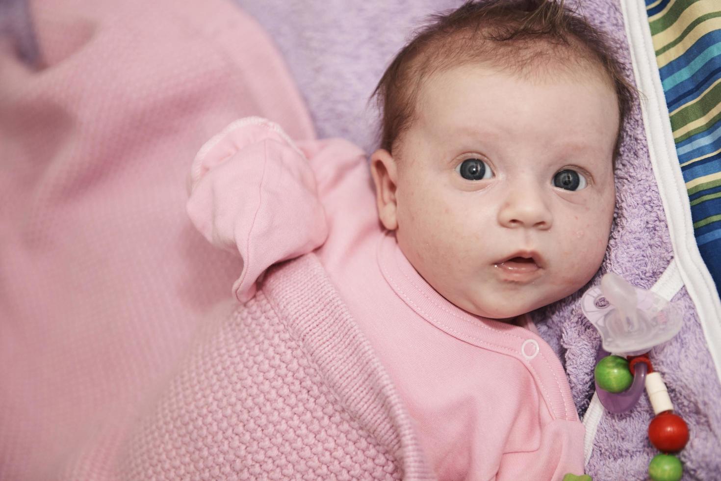 happy newborn little baby smilling photo