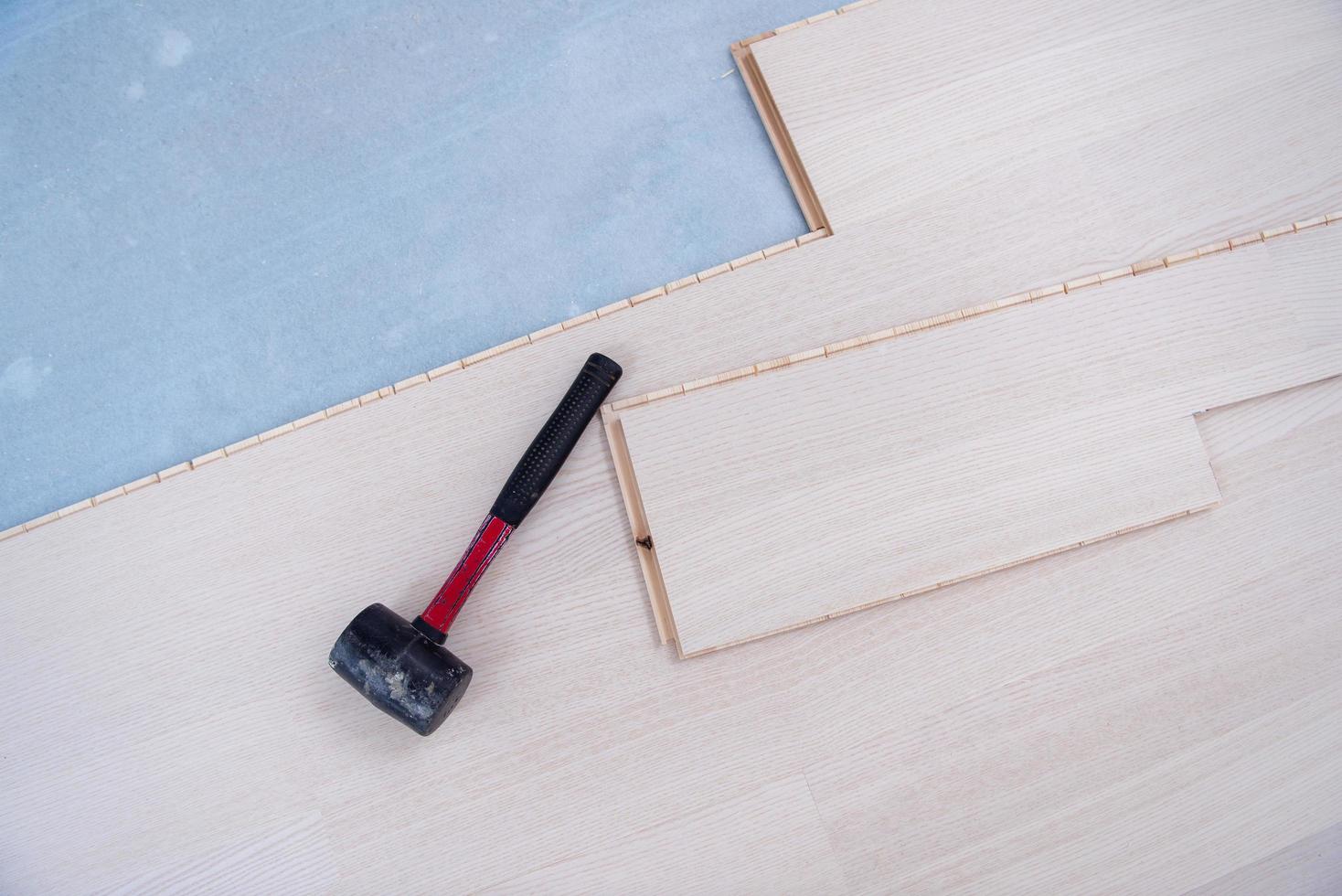 Instalation of laminated floor at home photo